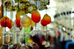 Handmade souvenir decorated with different sea shells photo
