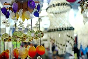 Handmade souvenir decorated with different sea shells photo