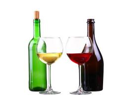 Red and white wine bottles on white background photo