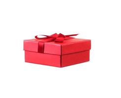 Red gift box with white ribbon isolated on red background. Clipping path included. photo