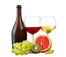 glass of red wine grapefruit isolated on a white background photo