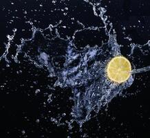 lime drop into water photo