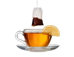 lemon tea with a splash on a white background photo