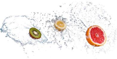 Studio shot of fresh grapefruit with water splash, isolated on white background photo