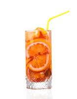 pitcher with a refreshing drink with lemon slices of orange and kiwi on white background photo