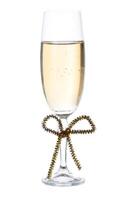 glass with champagne .with a bow Isolated on white with clipping path. photo