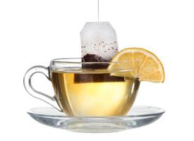 lemon tea with a splash on a white background photo