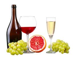 glass of red wine grapefruit isolated on a white background photo