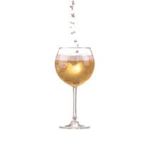 poured white wine on a white background photo