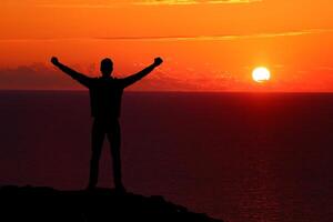 Man on top of mountain. Element of design. photo
