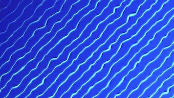 Abstract ocean wave animation on dark blue background, animated digital wavy pattern suitable for motion graphics, landscapes, gradient backdrops and dynamic spaces. video