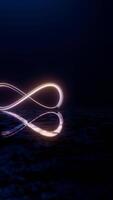 Infinity Symbol with Neon Glow and Reflection on Dark Surface video