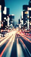 Colorful blurred traffic at night with bokeh lights in an urban setting photo