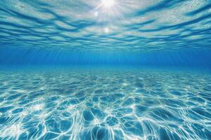 Serene turquoise ocean under bright sun reflects clouds and waves at midday by the coast photo