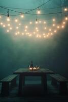 Cozy outdoor dining area illuminated by string lights at a restaurant in the evening photo
