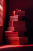 A stack of beautifully designed red gift boxes with intricate patterns in a cozy setting photo