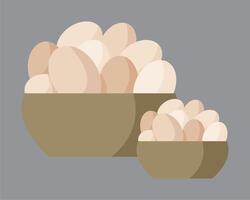 two bowls of eggs on a gray background vector