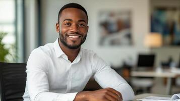 Smiling man in a cozy caf setting, enjoying a lively atmosphere during evening hours photo