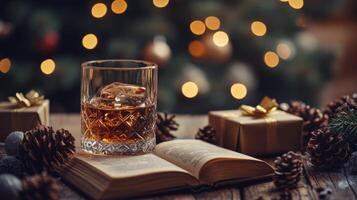 Cozy evening with a book, whiskey, and festive decorations during winter holidays photo