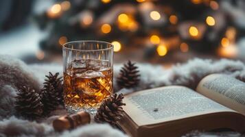 Cozy evening with a book, whiskey, and festive decorations during winter holidays photo