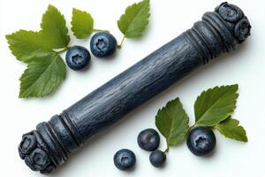 Fresh blueberries and green leaves arranged in a circular pattern on a light background photo