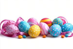 Decorated Easter eggs and pastel ribbons arranged on a white background for spring celebrations photo