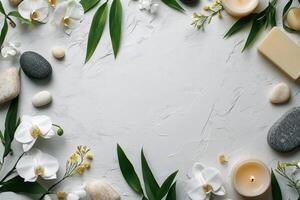 A serene arrangement of orchids, stones, and a candle on a textured surface in a tranquil setting photo