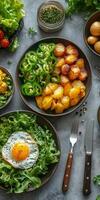 Healthy breakfast bowl with green vegetables, potatoes, egg, and mango arranged on a rustic table photo
