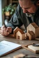 Crafting intricate wooden house models in a well lit workshop during daytime hours photo