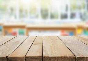 Beautiful wooden table in a bright room with soft natural light and pastel walls photo
