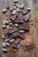 Decadent chocolate composition featuring cocoa beans and powder on wooden surface photo