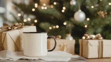 Cozy mug beside wrapped gifts and a decorated Christmas tree with glowing lights photo
