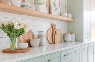 Fresh tulips brighten a modern kitchen decor with soft colors and elegant design elements photo