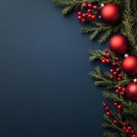 Decorative Christmas elements with red ornaments and pine branches on a dark background photo