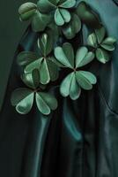 Delicate green clovers surrounded by dark foliage in a serene natural setting photo