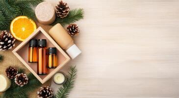 Aromatherapy setup with essential oils, natural ingredients and seasonal decorations on a table photo