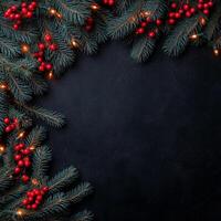 Decorative holiday greenery with twinkling lights and red berries on a dark background photo