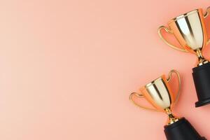 A variety of small trophies arranged creatively on a colorful background with decorative elements photo