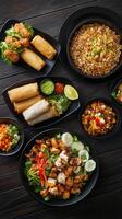 Delicious assortment of Asian cuisine served on black plates at a vibrant restaurant table photo