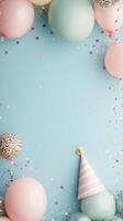 Colorful party decoration with balloons, confetti, and a party hat against a light blue background photo