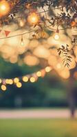 Twinkling lights create a festive atmosphere in a garden setting during evening hours photo
