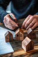 Crafting intricate wooden house models in a well lit workshop during daytime hours photo