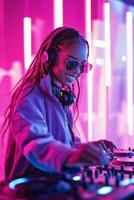 Young woman enjoys mixing music at a vibrant nightclub with neon lights during a lively event photo