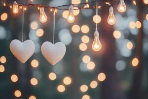 Beautiful heart decorations hanging in the evening light during a romantic outdoor event photo