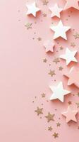 Colorful stars in various sizes scattered on a pink background for celebration or decoration photo