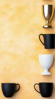 Trophy collection on yellow background displaying achievements in various competitions and events photo