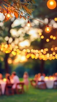 Twinkling lights create a festive atmosphere in a garden setting during evening hours photo