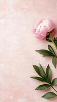 Soft pink flower blooming with a gentle blue background in a serene atmosphere photo