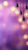 Hanging light bulbs illuminate a starry night sky in a purple backdrop at a cozy outdoor setting photo