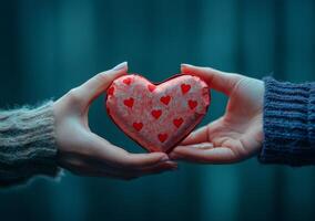 Hands passing a sparkling heart, symbolizing love and connection in a warm setting photo